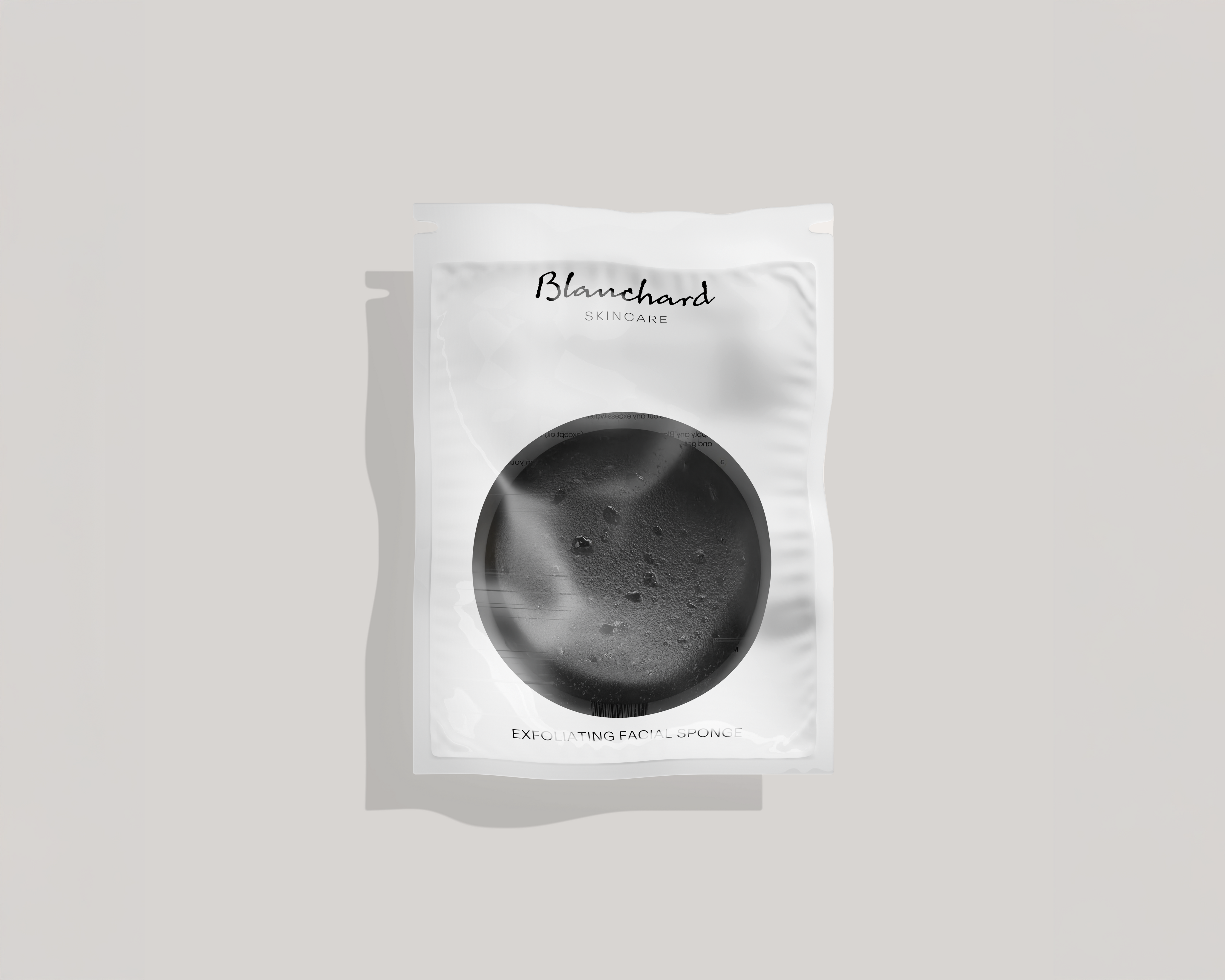 Natural Konjac Exfoliating Facial Sponge packaging by Blanchard Skincare on light gray background